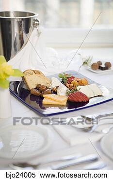 Stock Image - fruit and cheese 
platter on table. 
fotosearch - search 
stock photos, 
pictures, images, 
and photo clipart