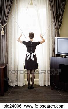 Stock Photo - maid looking out 
window. fotosearch 
- search stock 
photos, pictures, 
images, and photo 
clipart