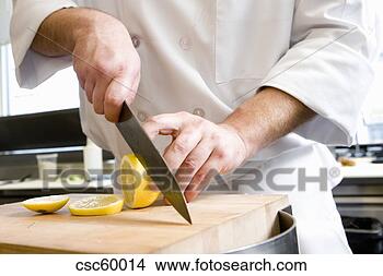 Banco de Imagem - macho,  cozinheiro, 
 cortar,  limão. 
fotosearch - busca 
de fotos, imagens 
e clipart