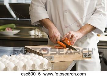 Banco de Imagem - macho,  cozinheiro, 
 cortar,  tomate. 
fotosearch - busca 
de fotos, imagens 
e clipart