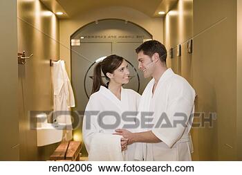 Stock Photo - couple in bathrobes 
smiling at each 
other. fotosearch 
- search stock 
photos, pictures, 
images, and photo 
clipart
