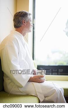 Stock Photo - man holding cup 
of tea. fotosearch 
- search stock 
photos, pictures, 
images, and photo 
clipart