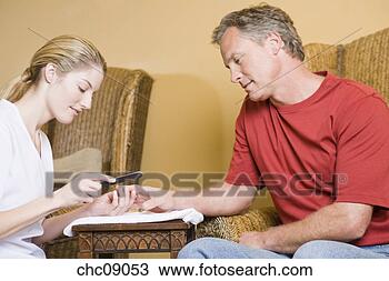 Stock Photo - man receiving 
spa manicure. 
fotosearch - search 
stock photos, 
pictures, images, 
and photo clipart