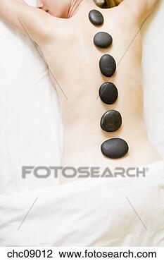 Banco de Imagem - mulher,  recebendo, 
 spa,  pedra, 
 tratamento. fotosearch 
- busca de fotos, 
imagens e clipart