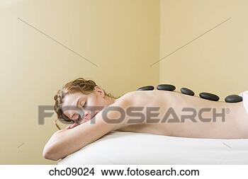 Banco de Imagem - mulher,  recebendo, 
 spa,  pedra, 
 tratamento. fotosearch 
- busca de fotos, 
imagens e clipart