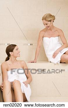 Stock Photography - two women sitting 
in sauna. fotosearch 
- search stock 
photos, pictures, 
images, and photo 
clipart