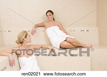 Stock Photography - two women sitting 
in sauna. fotosearch 
- search stock 
photos, pictures, 
images, and photo 
clipart