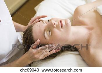 Stock Photography - woman receiving 
facial massage. 
fotosearch - search 
stock photos, 
pictures, images, 
and photo clipart
