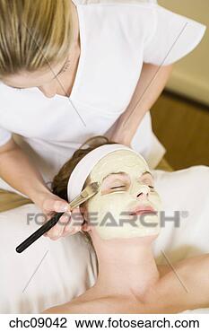 Stock Photo - woman receiving 
facial spa treatment. 
fotosearch - search 
stock photos, 
pictures, images, 
and photo clipart