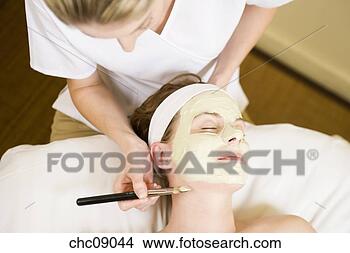 Stock Photo - woman receiving 
facial spa treatment. 
fotosearch - search 
stock photos, 
pictures, images, 
and photo clipart