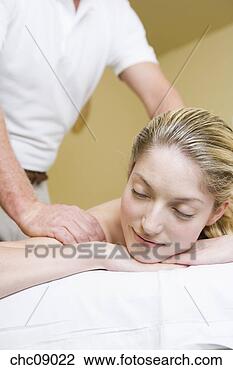 Stock Photo - woman receiving 
massage. fotosearch 
- search stock 
photos, pictures, 
images, and photo 
clipart