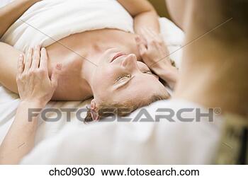 Stock Photography - woman receiving 
massage. fotosearch 
- search stock 
photos, pictures, 
images, and photo 
clipart