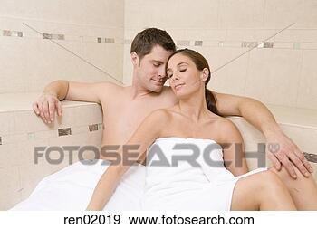 Stock Photograph - young couple hugging 
in sauna. fotosearch 
- search stock 
photos, pictures, 
images, and photo 
clipart