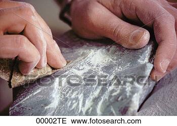 Stock Photo - working with soapstone. 
fotosearch - search 
stock photos, 
pictures, images, 
and photo clipart