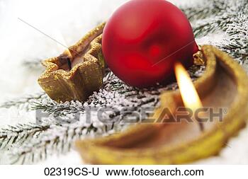 Stock Photo - christmas candles 
and baubles, close-up. 
fotosearch - search 
stock photos, 
pictures, images, 
and photo clipart