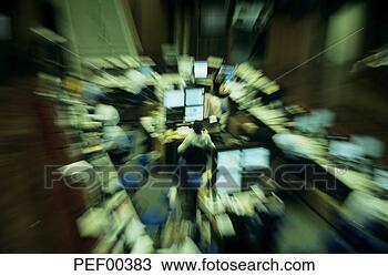 Stock Photo - people working 
in stock exchange 
(defocussed), 
elevated view. 
fotosearch - search 
stock photos, 
pictures, images, 
and photo clipart