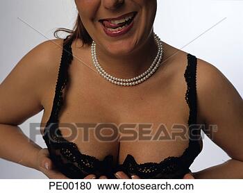 Stock Photography - woman, hands holding 
breast. fotosearch 
- search stock 
photos, pictures, 
images, and photo 
clipart