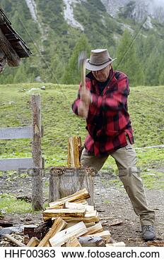 Stock Photo - austria, man chopping 
wood. fotosearch 
- search stock 
photos, pictures, 
images, and photo 
clipart