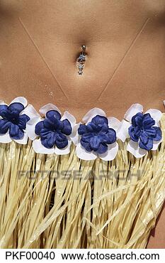 Stock Photography - woman wearing 
bast skirt and 
piercing, close-up. 
fotosearch - search 
stock photos, 
pictures, images, 
and photo clipart