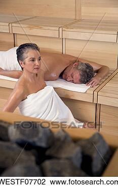 Stock Photo - mature couple 
in sauna. fotosearch 
- search stock 
photos, pictures, 
images, and photo 
clipart