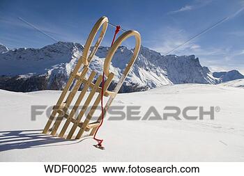 Stock Image - switzerland, graubuenden, 
savognin, winter 
scenery with sledge. 
fotosearch - search 
stock photos, 
pictures, images, 
and photo clipart