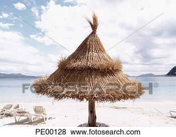 Stock Photo - beach umbrella 
and chairs on 
beach. fotosearch 
- search stock 
photos, pictures, 
images, and photo 
clipart