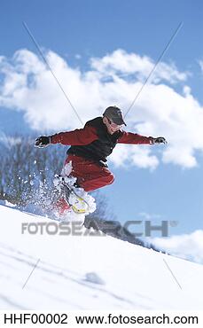 Banco de Imagem - menino,  snowshoeing, 
 meio,  ar. fotosearch 
- busca de fotos, 
imagens e clipart