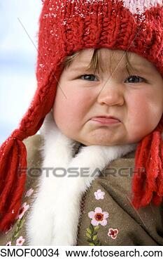 Stock Photo - girl ( 1-2 ) wearing 
cap, crying, close-up. 
fotosearch - search 
stock photos, 
pictures, images, 
and photo clipart
