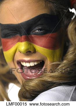 Stock Image - woman with german 
flag painted on 
face winking, 
close-up. fotosearch 
- search stock 
photos, pictures, 
images, and photo 
clipart
