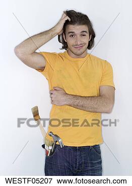 Picture - man with brush, 
hand on head. 
fotosearch - search 
stock photos, 
pictures, images, 
and photo clipart