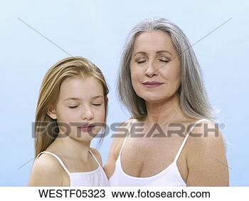 Stock Photo - grandmother and 
granddaughter, 
portrait. fotosearch 
- search stock 
photos, pictures, 
images, and photo 
clipart