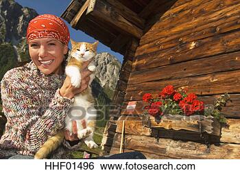 Banco de Imagem - mulher,  segurando, 
 gato. fotosearch 
- busca de fotos, 
imagens e clipart