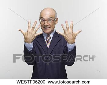 Arquivo de Fotografias - businesman,  fazer, 
 mão,  gesto, 
 retrato. fotosearch 
- busca de fotos, 
imagens e clipart