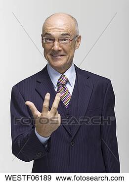 Arquivo Fotográficos - homem negócios, 
 fazer,  mão, 
 gesto,  retrato. 
fotosearch - busca 
de fotos, imagens 
e clipart