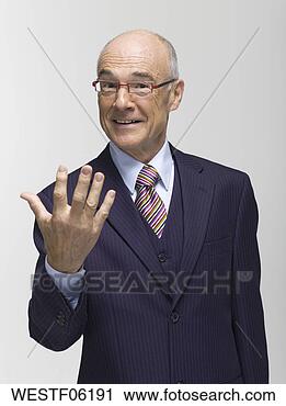 Arquivo de Fotografia - homem negócios, 
 fazer,  mão, 
 gesto,  retrato. 
fotosearch - busca 
de fotos, imagens 
e clipart