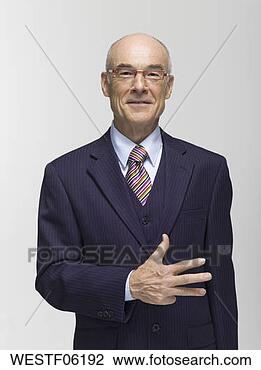 Banco de Imagem - homem negócios, 
 fazer,  mão, 
 gesto,  retrato. 
fotosearch - busca 
de fotos, imagens 
e clipart