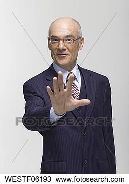 Banco de Imagem - homem negócios, 
 fazer,  mão, 
 gesto,  retrato. 
fotosearch - busca 
de fotos, imagens 
e clipart