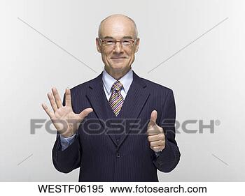 Banco de Imagem - homem negócios, 
 fazer,  mão, 
 gesto,  retrato. 
fotosearch - busca 
de fotos, imagens 
e clipart