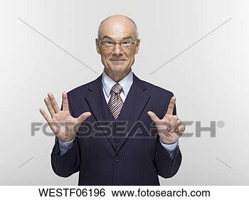 Banco de Imagem - homem negócios, 
 fazer,  mão, 
 gesto,  retrato. 
fotosearch - busca 
de fotos, imagens 
e clipart