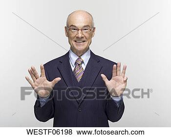 Banco de Imagem - homem negócios, 
 fazer,  mão, 
 gesto,  retrato. 
fotosearch - busca 
de fotos, imagens 
e clipart