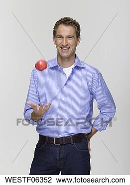 Banco de Imagem - jovem,  tocando, 
 maçã,  retrato. 
fotosearch - busca 
de fotos, imagens 
e clipart