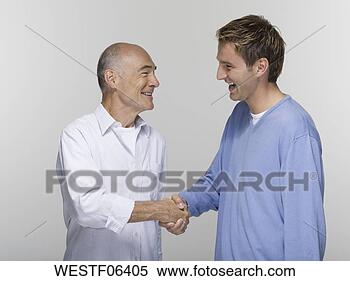 Banco de Imagem - sênior,  jovem, 
 agitação,  mãos, 
 retrato. fotosearch 
- busca de fotos, 
imagens e clipart