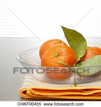 Banco de Imagem - tangerines,  vidro, 
 tigela,  close-up. 
fotosearch - busca 
de fotos, imagens 
e clipart