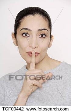 Banco de Imagem - jovem,  mulher, 
 dedo,  lábios, 
 retrato. fotosearch 
- busca de fotos, 
imagens e clipart