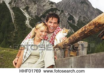 Arquivo Fotográficos - áustria,  salzburger, 
 terra,  jovem, 
 par,  gato,  
retrato. fotosearch 
- busca de fotos, 
imagens e clipart