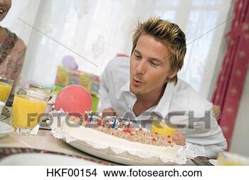 Banco de Imagem - soprando,  vela, 
 torte,  retrato. 
fotosearch - busca 
de fotos, imagens 
e clipart
