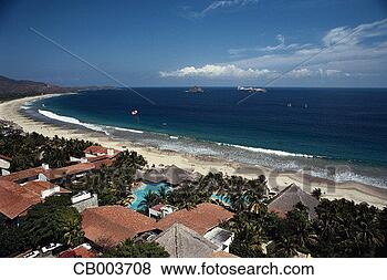 Stock Photo - hotel along a 
beach. fotosearch 
- search stock 
photos, pictures, 
images, and photo 
clipart