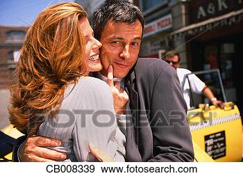 Stock Photograph - frisky couple. 
fotosearch - search 
stock photos, 
pictures, images, 
and photo clipart