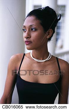 Stock Image - young woman in 
black dress. fotosearch 
- search stock 
photos, pictures, 
images, and photo 
clipart