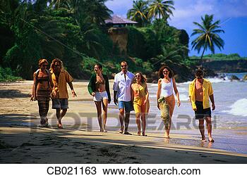 Stock Photo - friends walking 
on the beach. 
fotosearch - search 
stock photos, 
pictures, images, 
and photo clipart